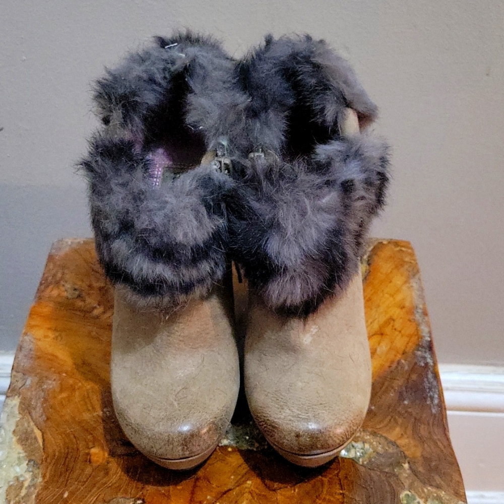 Luxury Rebel "boots with fur trim."